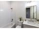 Bright bathroom with subway tiled shower and a stylish vanity, creating a functional and modern space at 585 Sherwood Ne Rd, Atlanta, GA 30324