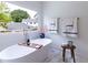The bathroom features a soaking tub with a scenic view, and a stylish design at 585 Sherwood Ne Rd, Atlanta, GA 30324