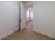 Bedroom with open closet doors and light-colored floor at 585 Sherwood Ne Rd, Atlanta, GA 30324
