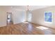 Large empty bedroom features hardwood floors, crown molding, and plentiful natural light at 585 Sherwood Ne Rd, Atlanta, GA 30324