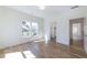 Bright bedroom with natural light, hardwood floors, and an open layout at 585 Sherwood Ne Rd, Atlanta, GA 30324