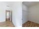 Walk-in closet with simple wire shelving and hardwood flooring at 585 Sherwood Ne Rd, Atlanta, GA 30324