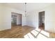 Spacious room showcasing great natural light and modern chandelier at 585 Sherwood Ne Rd, Atlanta, GA 30324