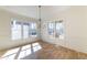 Bright dining room with natural light and modern chandelier at 585 Sherwood Ne Rd, Atlanta, GA 30324