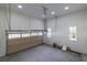 Spacious garage with overhead door and modern lighting at 585 Sherwood Ne Rd, Atlanta, GA 30324