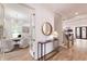 Inviting hallway with hardwood floors leading to a bright office space with large windows at 585 Sherwood Ne Rd, Atlanta, GA 30324