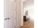 Hallway with a view of the kitchen and hardwood floors at 585 Sherwood Ne Rd, Atlanta, GA 30324