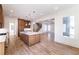 Open concept kitchen with hardwood floors and a view of the living room at 585 Sherwood Ne Rd, Atlanta, GA 30324