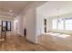 Bright and airy living room with hardwood floors, large windows, and modern chandelier at 585 Sherwood Ne Rd, Atlanta, GA 30324