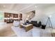 Bright and airy living room showcases hardwood floors and an open kitchen layout at 585 Sherwood Ne Rd, Atlanta, GA 30324