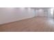 Spacious living room features light-colored flooring and neutral walls at 585 Sherwood Ne Rd, Atlanta, GA 30324