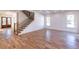 Spacious living room with hardwood floors and staircase at 585 Sherwood Ne Rd, Atlanta, GA 30324
