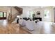 Spacious living room with hardwood floors, abundant natural light, and comfortable seating, perfect for relaxing at 585 Sherwood Ne Rd, Atlanta, GA 30324