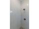 Elegant shower stall featuring white subway tile and modern fixtures at 585 Sherwood Ne Rd, Atlanta, GA 30324