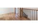 Staircase with wooden and iron railings and hardwood floors at 585 Sherwood Ne Rd, Atlanta, GA 30324