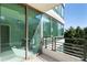 View from balcony with many windows and a view of treetops at 700 Park Regency Ne Pl # 803, Atlanta, GA 30326