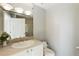 Bathroom featuring custom mirror and vanity with a large sink at 700 Park Regency Ne Pl # 803, Atlanta, GA 30326