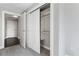 This home features a walk in closet with shelving and a view to the entry hallway at 700 Park Regency Ne Pl # 803, Atlanta, GA 30326
