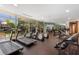Bright and airy gym space featuring treadmills, elliptical machines, and free weights for a comprehensive workout at 700 Park Regency Ne Pl # 803, Atlanta, GA 30326