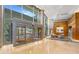 The building features an elegant lobby with grand entrance doors and modern design elements at 700 Park Regency Ne Pl # 803, Atlanta, GA 30326