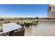 An open patio with lounge seating and dining area, offering beautiful skyline and treetop views at 700 Park Regency Ne Pl # 803, Atlanta, GA 30326