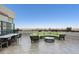 Expansive outdoor patio featuring a dining set and comfortable seating area with lush greenery at 700 Park Regency Ne Pl # 803, Atlanta, GA 30326