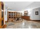 Sophisticated wine cellar featuring custom cabinetry, unique stone floors, and an inviting tasting area at 700 Park Regency Ne Pl # 803, Atlanta, GA 30326