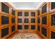 Close up of wine storage with individual storage lockers, secured with wire mesh, and vintage numbering plates at 700 Park Regency Ne Pl # 803, Atlanta, GA 30326