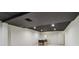 Finished basement ceiling with lighting above, neutral paint, and carpeted floors at 2411 Mitchell Ne Rd, Marietta, GA 30062