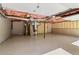 Unfinished basement with insulation, pipes, and a doorway leading to another area at 2411 Mitchell Ne Rd, Marietta, GA 30062