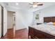 Bedroom with hardwood flooring, neutral walls, and a view to a connecting room at 2411 Mitchell Ne Rd, Marietta, GA 30062