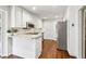 Kitchen featuring granite countertops, stainless steel appliances, and white cabinets at 2411 Mitchell Ne Rd, Marietta, GA 30062