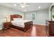 This main bedroom features hardwood floors, a ceiling fan, recessed lights, and a window with a view at 2411 Mitchell Ne Rd, Marietta, GA 30062
