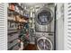 Pantry with washer and dryer, plus shelves for storage at 2411 Mitchell Ne Rd, Marietta, GA 30062