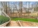Multi-level backyard featuring wooden steps and views at 2611 Winterthur Main Nw, Kennesaw, GA 30144
