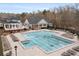 Large rectangular community pool with numerous lounge chairs surrounding it at 2611 Winterthur Main Nw, Kennesaw, GA 30144