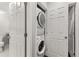 Conveniently located laundry room offers a stackable washer and dryer at 2611 Winterthur Main Nw, Kennesaw, GA 30144