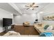 Open concept living room area featuring comfortable seating and natural light at 2611 Winterthur Main Nw, Kennesaw, GA 30144