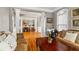 Inviting living room with hardwood floors, open layout, and traditional furnishings at 2611 Winterthur Main Nw, Kennesaw, GA 30144