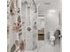 Modern bathroom featuring a tiled walk-in shower with seating at 2611 Winterthur Main Nw, Kennesaw, GA 30144