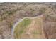 Aerial view of a well-maintained soccer field surrounded by trees at 2611 Winterthur Main Nw, Kennesaw, GA 30144