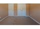 Bedroom featuring neutral paint and carpet and two closets at 4531 Flowering Br, Powder Springs, GA 30127