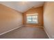 Bedroom featuring neutral paint and carpet, a vaulted ceiling, and bright natural light at 4531 Flowering Br, Powder Springs, GA 30127