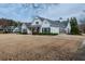 Charming single-story home with a large front yard, symmetrical design, and inviting curb appeal at 4531 Flowering Br, Powder Springs, GA 30127