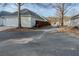 A street view showing the home's garage, back yard wooden fence, and part of its driveway at 4531 Flowering Br, Powder Springs, GA 30127