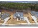 Captivating aerial view of a luxurious home with a lush, wooded lot, and ample parking space for ultimate privacy and convenience at 4921 Slaton Dr, Acworth, GA 30101