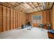 Large unfinished basement area with a window providing natural light, perfect for a home gym or entertainment space at 4921 Slaton Dr, Acworth, GA 30101