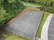 Fenced basketball court with well-maintained lines, providing a great space for sports and recreation at 4921 Slaton Dr, Acworth, GA 30101