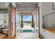 Interior entrance boasting barn doors and stunning views at 4921 Slaton Dr, Acworth, GA 30101
