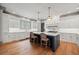 Lovely kitchen with island seating, pendant lighting, and plenty of counter space at 4921 Slaton Dr, Acworth, GA 30101